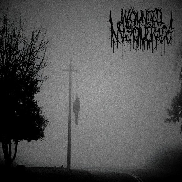 WOUNDED MASQUERADE - Forlorn